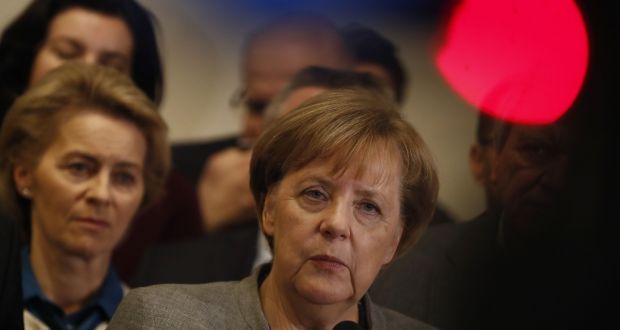 Tough talks to form Germany’s next government stretched into overtime, putting Chancellor Angela Merkel’s political future in the balance since failure to produce a deal could force snap elections. Photograph: Odd ANDERSENODD ANDERSEN/AFP/Getty Images