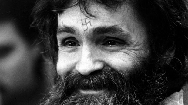 In this 1986, file photo, convicted murderer Charles Manson looks towards the parole board in San Quentin, California. Photograph: Eric Risberg/AP
