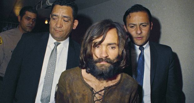 In this 1969 file photo, Charles Manson is escorted to his arraignment on conspiracy-murder charges in connection with the Sharon Tate murder case.  Photograph: AP