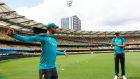 Australia’s Nathan Lyon warms up during a nets session at the Gabba in  Brisbane.  Photograph : Jason O’Brien/PA 