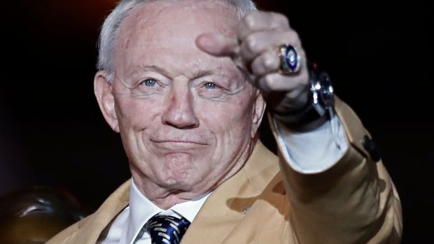 Dallas Cowboys owner Jerry Jones holds up his hand with his Pro Football Hall of Fame ring that he received at half-time against the Philadelphia Eagles in the first half of their game at AT&T Stadium in Arlington, Texas last weekend. Photo: Larry W. Smith/EPA
