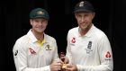 Steve Smith, captain of Australia and Joe Root, captain of England pose with the Ashes urn. Photo: Ryan Pierse/Getty Images