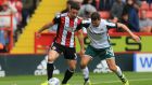 Enda Stevens in action for Sheffield United under pressure from Matty Pearson of Barnsley. Photograph: Mark Cosgrove/Action Plus via Getty Images