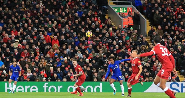 Willian scores Chelsea’s  equaliser at Anfield. Photograph: Peter Byrne/PA Wire.  