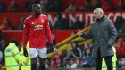 Romelu Lukaku speaks with José Mourinho during the Premier League match against Brighton and Hove Albion. Photograph: Alex Livesey/Getty Images