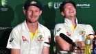 Australia’s captain Steve Smith reacts as team mate Cameron Bancroft speaks after their sides resoundign win over England. Photograph: Darren England/AAP