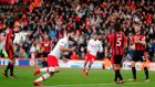 Charlie Austin celebrates after scoring at the Vitality Stadium in Bournemouth. Photograph: Getty Images