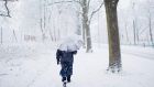 A pedestrian walks on snow on December 3rd, 2017 in Hannover, central Germany. Photograph: AFP/Julian Stratenschulte/Getty