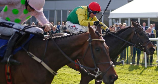  Robbie Power riding Sizing John (R) pips Djakadam (L) to claim the Punchestown Gold Cup last  April. Photograph: Alan Crowhurst/Getty Images