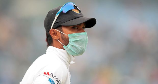  A Sri Lankan player wearing a face mask during his side’s Test match against India. Photograph: Stringer/Reuters