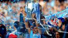  Sergio Aguero of Manchester City celebrates with the Premier League trophy in 2012. Photograph:  Shaun Botterill/Getty Images