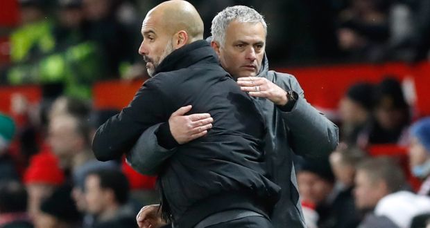 Manchester City manager Pep Guardiola and Manchester United manager Jose Mourinho after the final whistle  at Old Trafford. Photograph: Martin Rickett/PA Wire