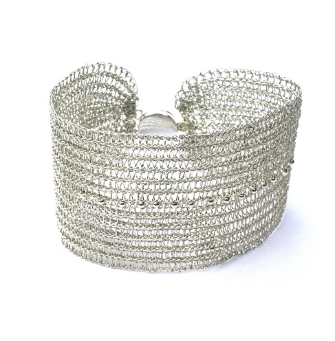 Hand crocheted cuff in sterling silver wire with sterling silver beads and clasp by Juno James €65 at Design House, Dublin