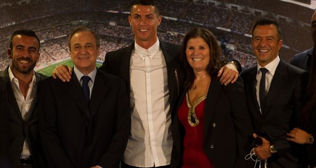 Real Madrid star Cristiano Ronaldo is flanked by his mother and club president Florentino Perez, who has never been close with the Portuguese since his arrival at the club. Photograph: Denis Doyle/Getty Images