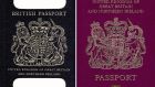 Picture of an old British passport (left) and a burgundy UK passport in the European Union style format. Photograph: PA Wire