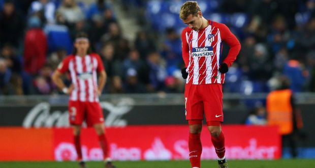  Atletico Madrid’s Antoine Griezmann has his head down after Espanyol score the only goal of Friday night’s game. Photograph: Albert Gea/Reuters