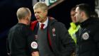 Arsene Wenger remonstrates with referee Mike Dean. Photograph: Jason Cairnduff/Action Images via Reuters