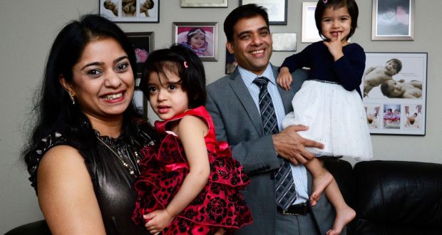 Ramakrishnan Ramanathan with his wife, Suchi, and their children Maya and Meera at their home in Blanchardstown. Photograph: Cyril Byrne