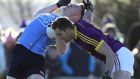 Wexford’s Brian Malone and Paddy Small of Dublin compete for the ball. Photograph: Bryan Keane/Inpho