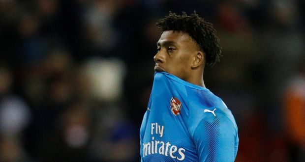 Arsenal’s Alex Iwobi looks dejected after his team’s defeat in the FA Cup third round. Photograph: Darren Staples/Reuters