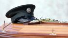 PSNI constable Ronan Kerr’s hat rests on his coffin at his funeral in 2011 after he was targeted and killed by dissidents. File photograph: Paul Faith/PA Wire