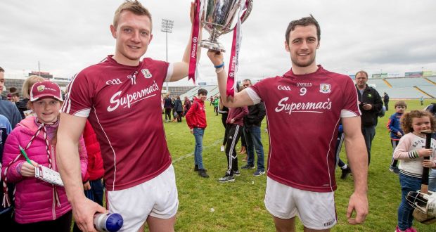 Galway’s Joe Canning and captain David Burke celebrate victory over Tipperary in  last year’s Allianz Hurling League final. Photograph: Morgan Treacy/Inpho