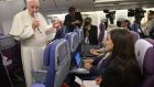  Pope Francis  speaks to journalists aboard his flight to Italy at the end of his visit to South America on Monday. Photograph: EPA/Luca Zennaro