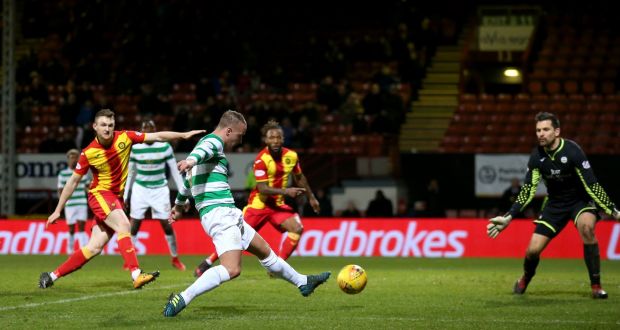 Leigh Griffiths scores Celtic’s   second goal of the game during the Ladbrokes Premiership match against Partick Thistle at Firhill Stadium in Glasgow. Photograph: Andrew Milligan/PA Wire