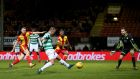 Leigh Griffiths scores Celtic’s   second goal of the game during the Ladbrokes Premiership match against Partick Thistle at Firhill Stadium in Glasgow. Photograph: Andrew Milligan/PA Wire