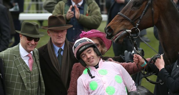 Jockey Ruby Walsh alongside owner Rich Ricci and trainer Willie Mullins after winning  Arkle Trophy on Douvan in 2016. Photograph:  Dan Sheridan/Inpho