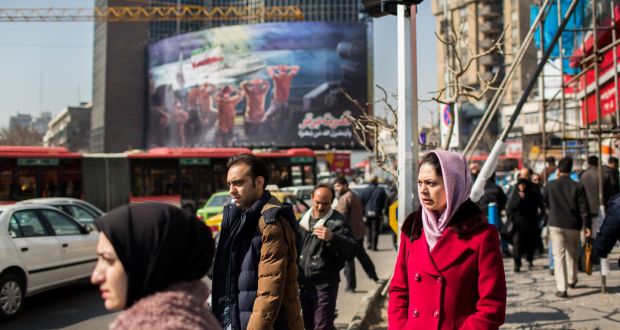 Pedestrians on the streets of Tehran last February. Twenty-nine people, most of them women, have been arrested in connection with recent protests in Iran against the compulsory Islamic veil for women. Photograph: Arash Khamooshi/The New York Times