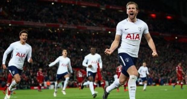 Harry Kane of Spurs scoring his 100th top-flight goal after converting a 95th minute penalty against Liverpool. Photograph: Getty Images   
