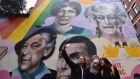 Students take a selfie against a mural including Emmeline Pankhurst (top left) in Manchester to mark the 100th anniversary of the Representation of People Act which allowed women to vote in the UK. Photograph: Anthony Devlin/Getty Images