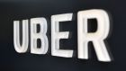The  Uber logo is pictured outside its corporate HQ in San Francisco. Photograph: Josh Edelson / AFP / Getty Images