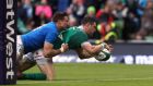 Robbie Henshaw scores against Italy, injuring his shoulder in the process. Photograph: Brian Lawless/PA
