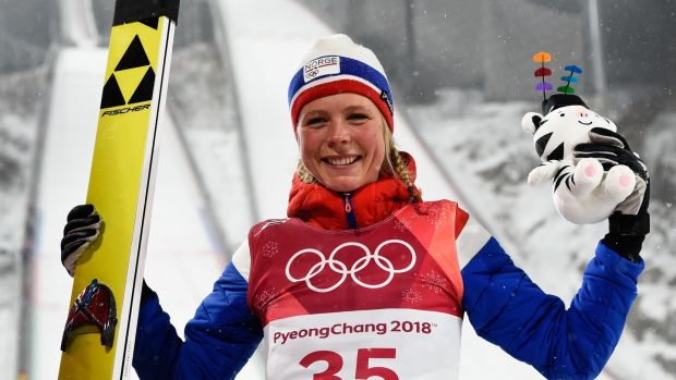 Norway’s Maren Lundby flies through blizzard to take ski jumping gold