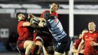 Munster’s Rhys Marshall and Gerbrandt Grobler fight for possession with  Cardiff Blues’ Rhun Williams at Cardiff Arms Park. Photograph: Kevin Barnes/Inpho 