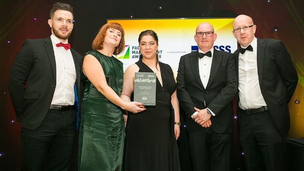 John Lawlor, Managing Director, Synergy Security Solutions present the Property Management Company of the Year award to Winters Property Management DAC Team