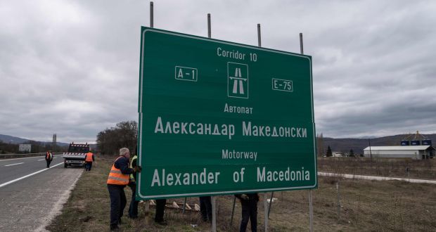 Workers remove a sign with the former name of the highway leading to the Greek border, “Alexander of Macedonia”, newly renamed “Friendship Highway”, near Skopje on February 21st. The government decided to change the name of the highway, along with the name of the Skopje airport, following the name dispute with Greece. Photograph:  Robert Atanasovski/Getty Images