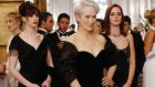 Meryl Streep (c) with Anne Hathaway (l) and Emily Blunt (r)  in ‘The Devil Wears Prada’. 