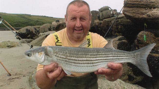 Ian Mulligan from Dublin with his record-breaking Rosscarbery golden grey mullet