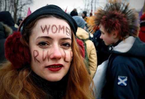 A member of the Russian feminist movement at a rally dedicated to the struggle for women's rights and against the Patriarchate in St. Petersburg, Russia. Photograph: Anatoly Maltsev / Reuters 
