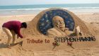 Indian sand artist Sudarsan Pattnaik creates a sand sculpture in honour of the late Stephen Hawking, at Puri beach in  India, this week. Photograph:  STR/EPA