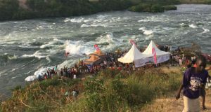 A competitor takes part in the Nile River Festival 2018 on the Nile Special wave in Uganda. A new dam will flood the wave by the end of the year. Photograph: Dan Griffin