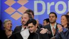 Dropbox co-founders Drew Houston and Arash Ferdowsi embrace after ringing the opening bell on the Nasdaq Stock Market as Dropbox is listed for the company’s initial public offering. Photograph: Lucas Jackson/Reuters