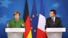 Germany’s chancellor Angela Merkel with French president Emmanuel Macron: expressed solidarity with Britain days after the attack. Photograph:  AFP/Getty Images