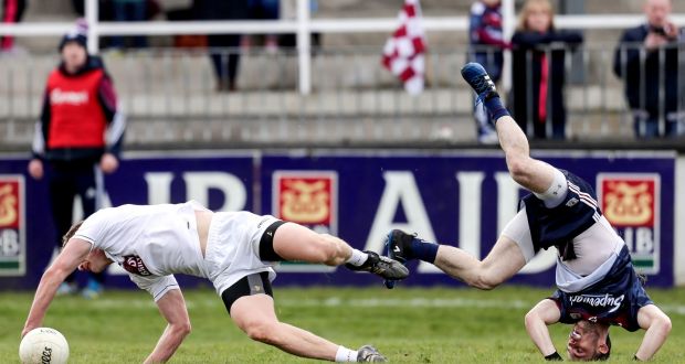 Frankie Burke of Galway and Kildare’s Peter Kelly go their separate ways during the Allianz Football League Division One game at St Conleth’s Park in Newbridge. Photograph: Laszlo Geczo/Inpho