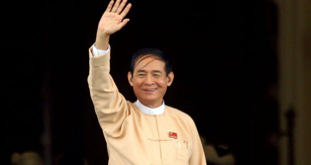 Win Myint waves after he was elected as Myanmar’s president in parliament at Naypyitaw, Myanmar on Wednesday. Photograph: Reuters 