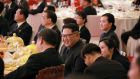Kim Jong-un in Beijing: the North Korean leader with Xi Jinping, the Chinese president, at a banquet at the Great Hall of the People. Photograph: KCNA via AP