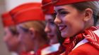 Airline staff from Aeroflot-Russian Airlines PJSC. The Russian state-controlled airline is to launch a direct flight from Moscow to Dublin even as Ireland’s relations with the Kremlin chill following the expulsion of one of their diplomats.  Photographer: Simon Dawson/Bloomberg